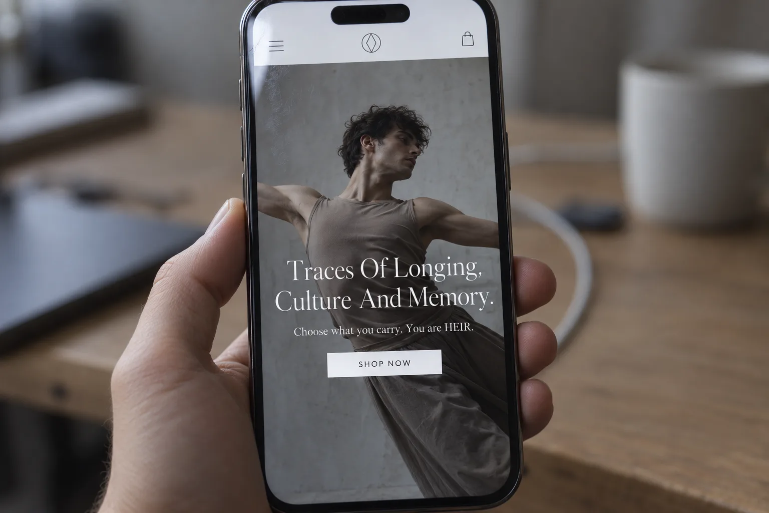 The HEIR storefront on a phone, its full-screen hero image and shop button