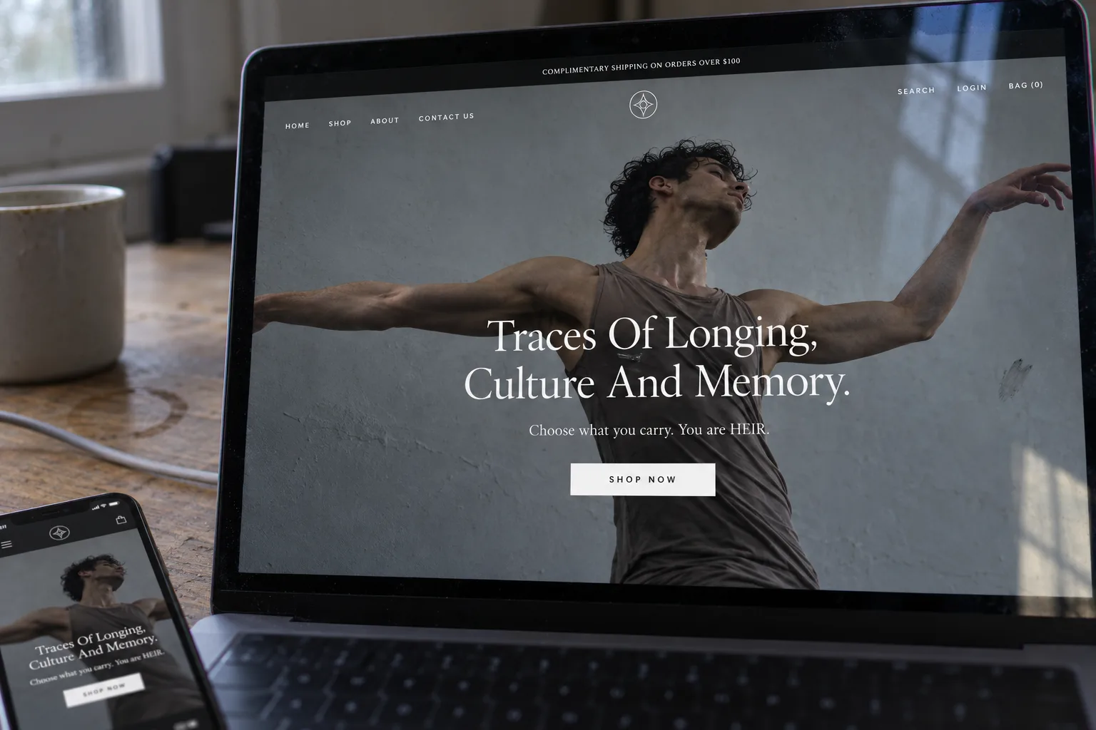 The HEIR fragrance store open on a laptop, with the same homepage on a phone beside it