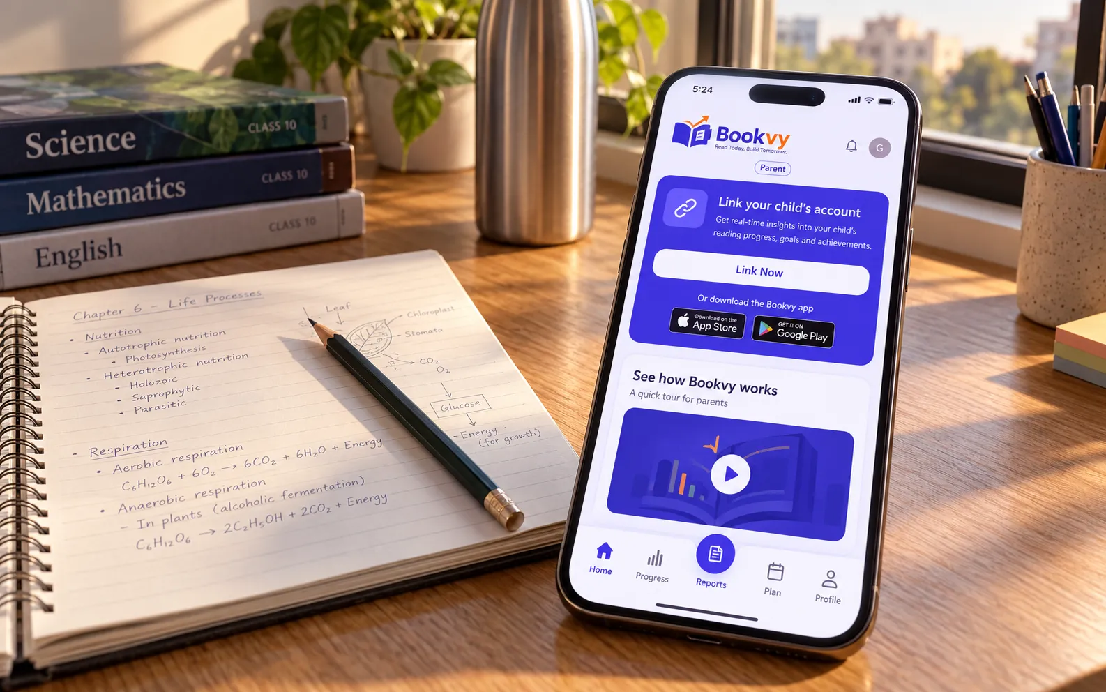 The Bookvy app on an iPhone lying on a student's desk next to a notebook