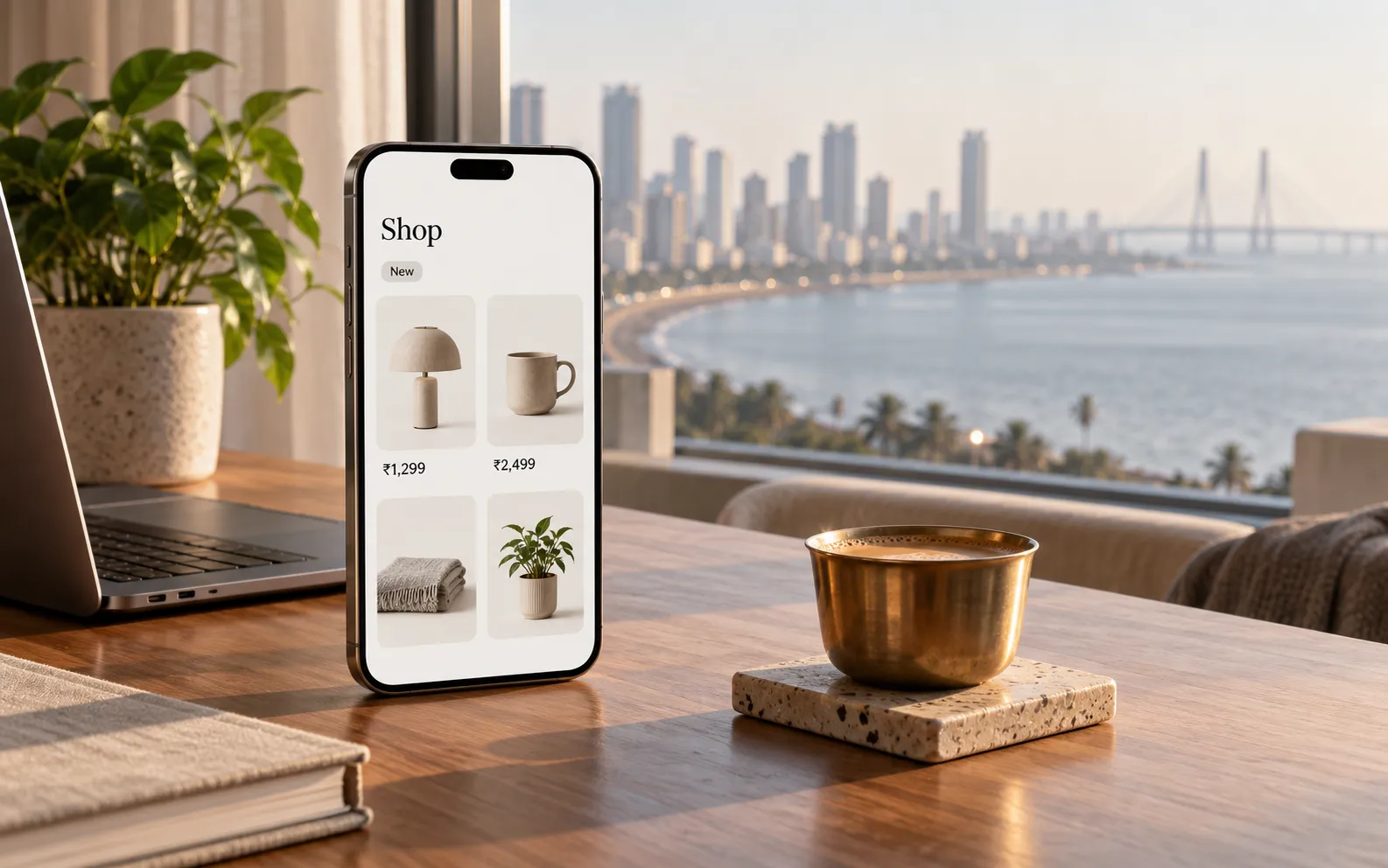 A phone with a shopping app on a teak desk overlooking the Mumbai skyline
